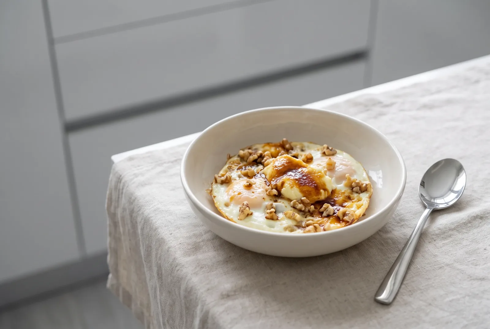 Baked Eggs with Kaymak and Walnuts | A Honey-Walnut Breakfast Casserole