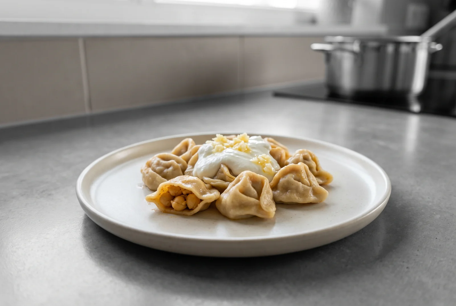Nohutlu Mantı (Chickpea Dumplings with Garlic Yogurt)